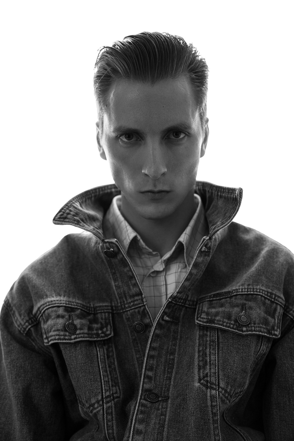 NIKOLAI T.