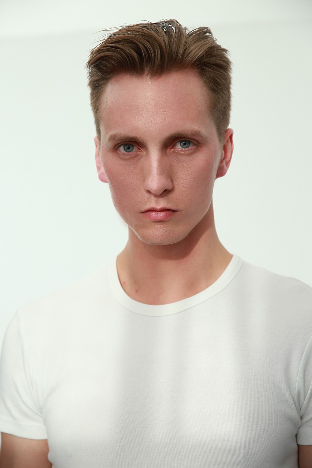 NIKOLAI T.