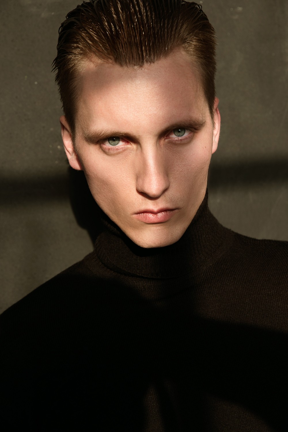 NIKOLAI T.