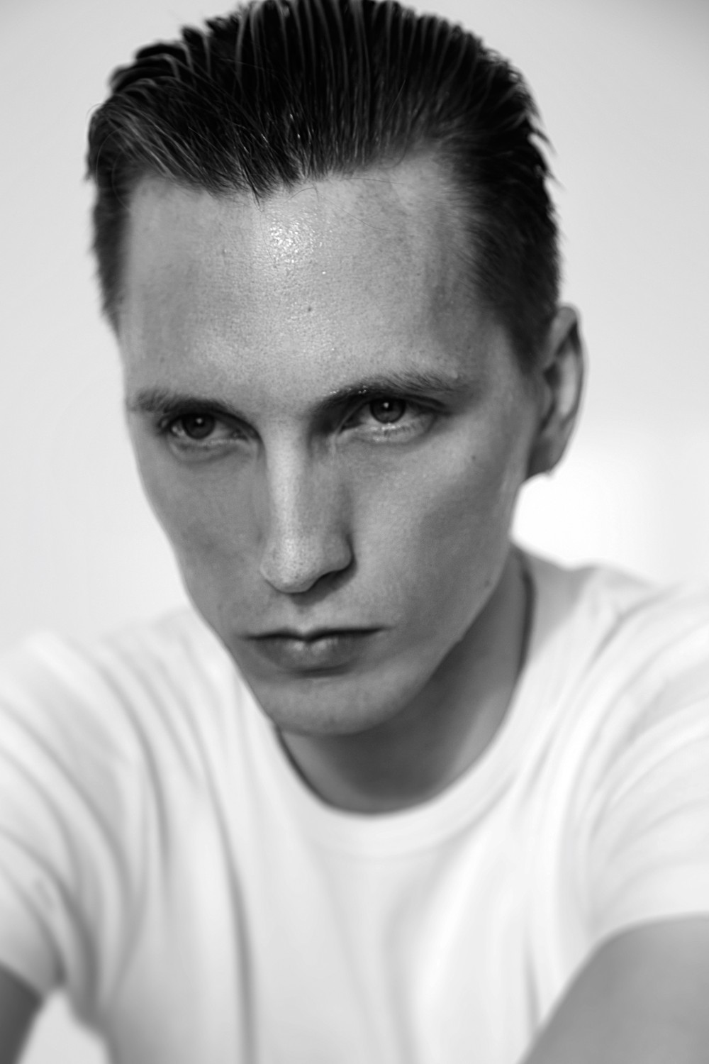 NIKOLAI T.