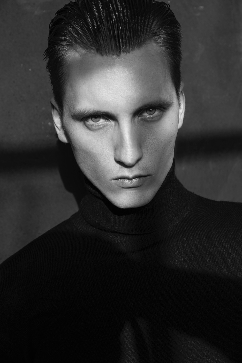 NIKOLAI T.