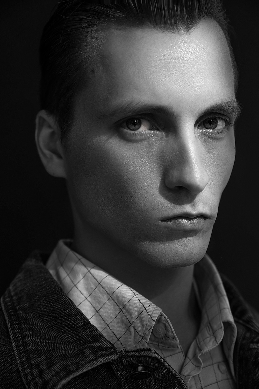 NIKOLAI T.
