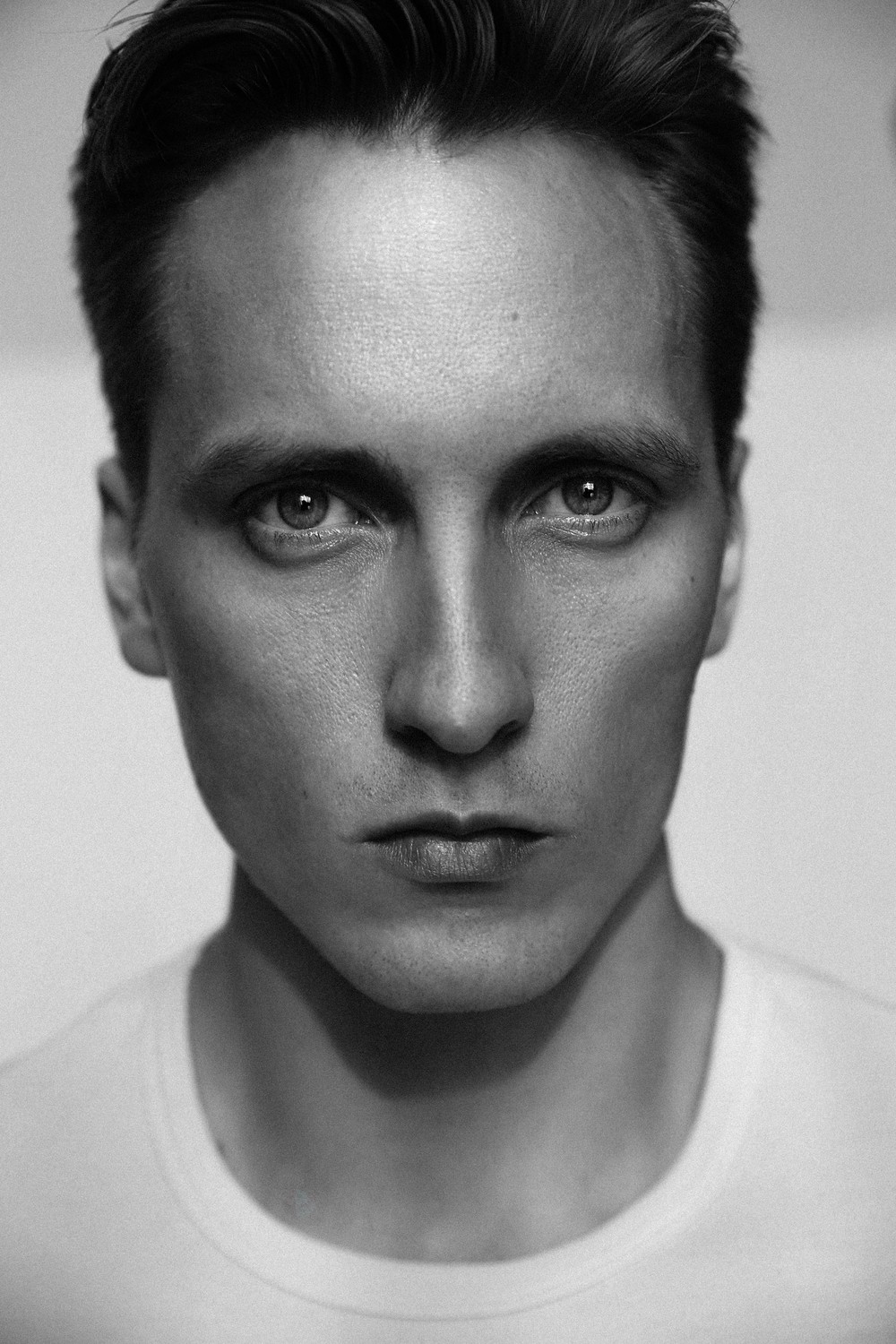 NIKOLAI T.