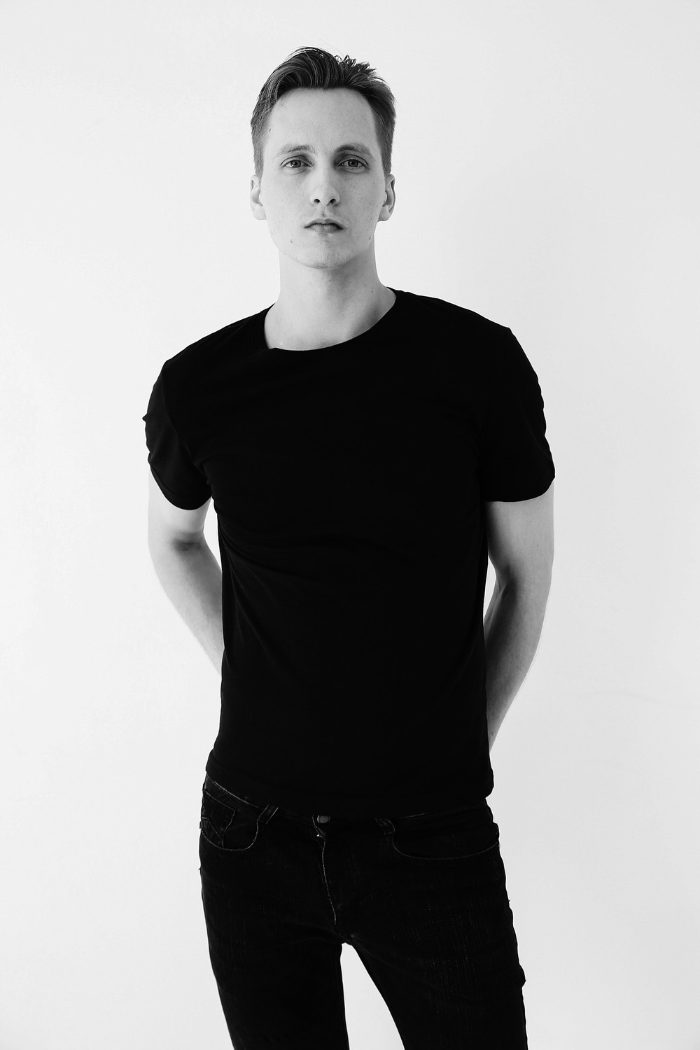 NIKOLAI T.