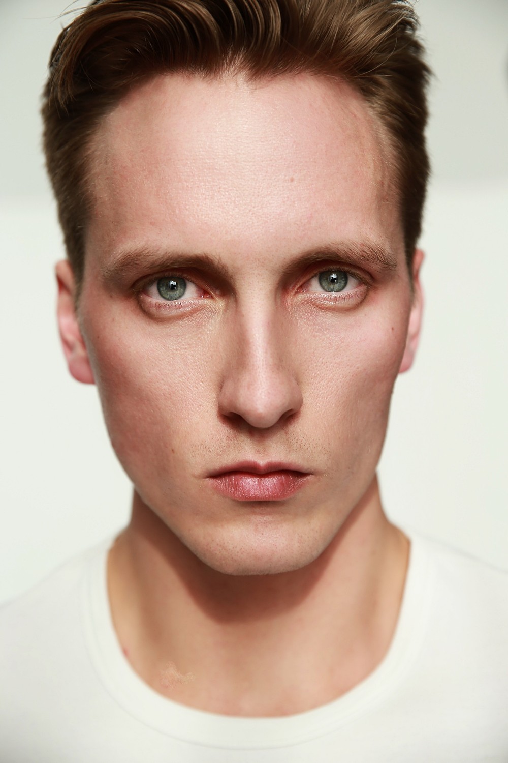 NIKOLAI T.