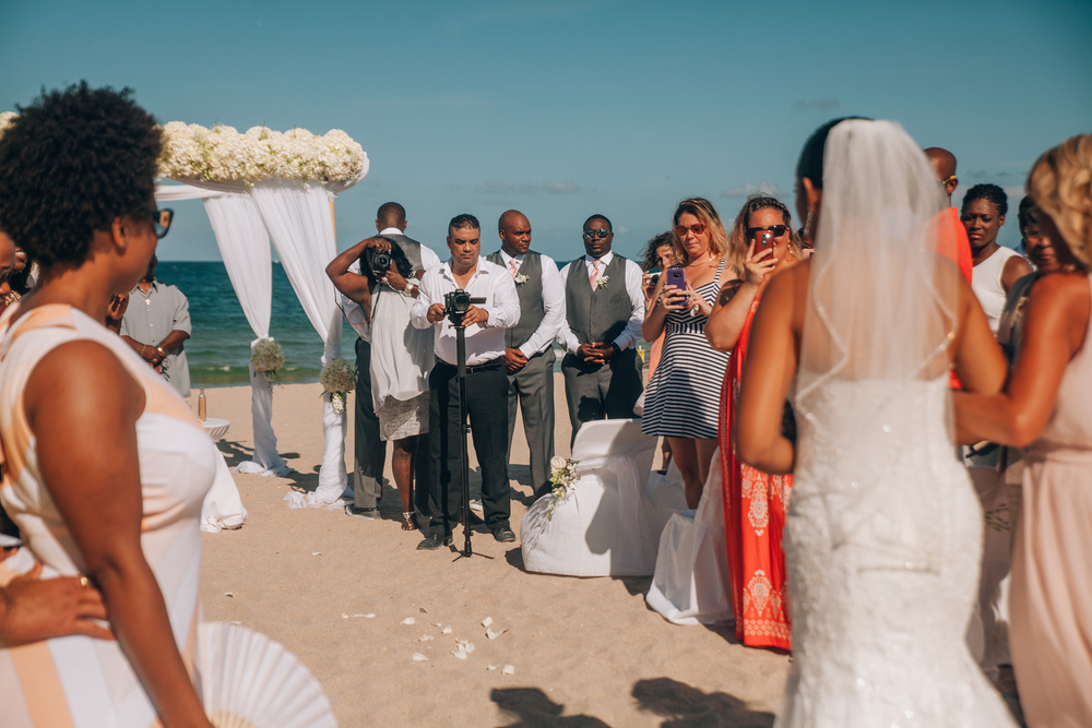J + J. Beach wedding
