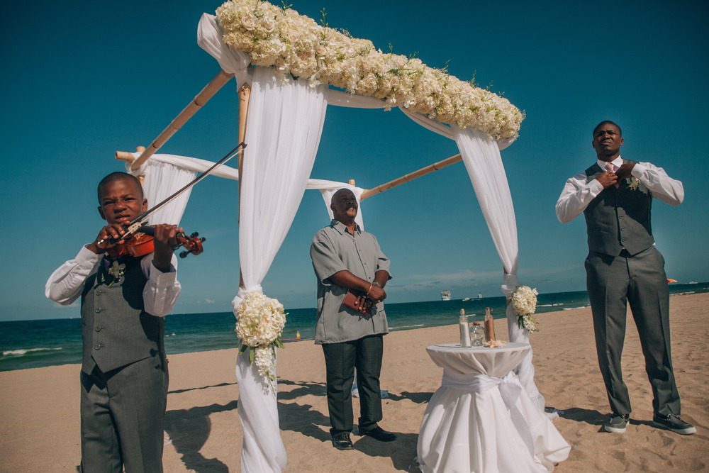 J + J. Beach wedding