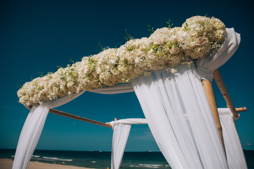 J + J. Beach wedding