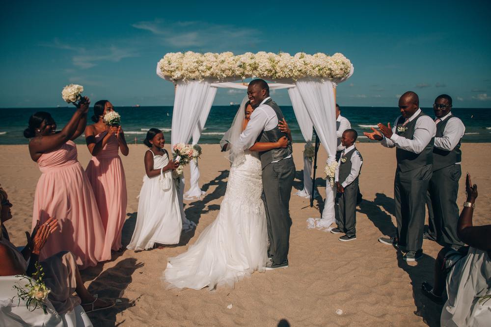 J + J. Beach wedding