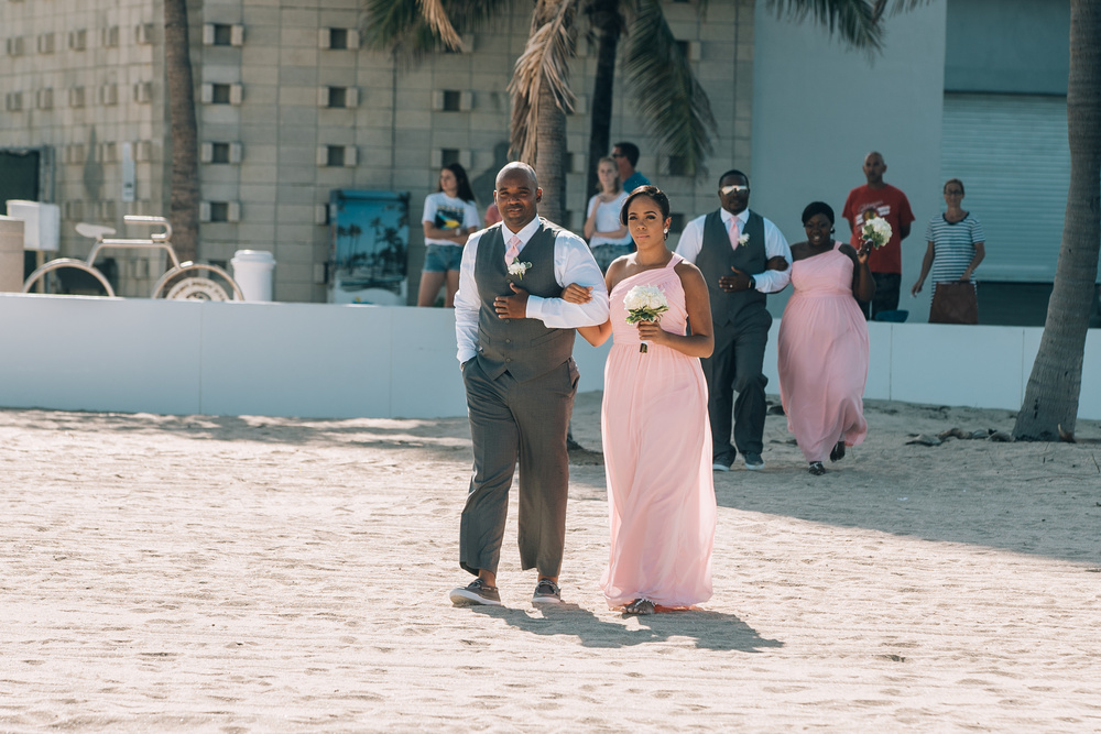 J + J. Beach wedding