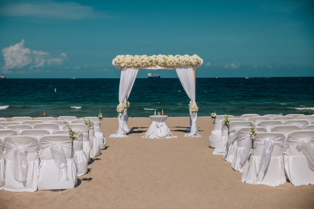 J + J. Beach wedding